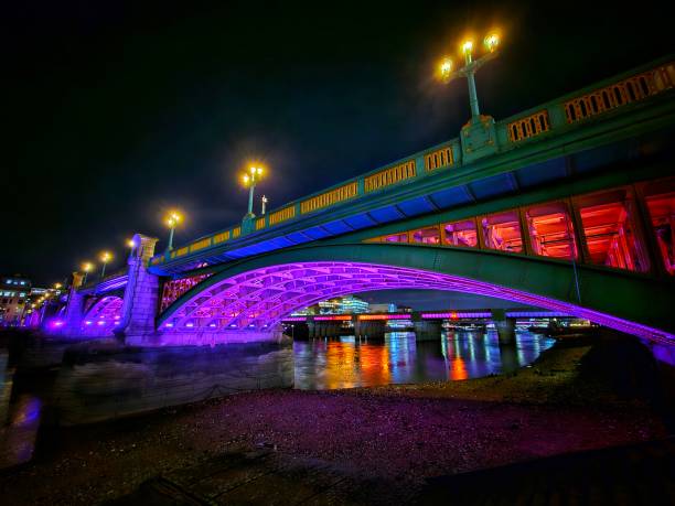 istock Southwark Bridge illuminated at night in London, UK 2168042925
