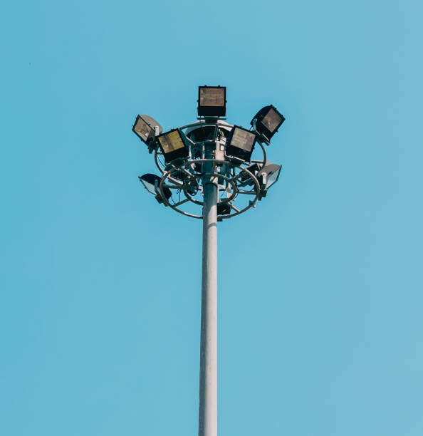 istock street lamp post isolated in blue sky background 2168043946