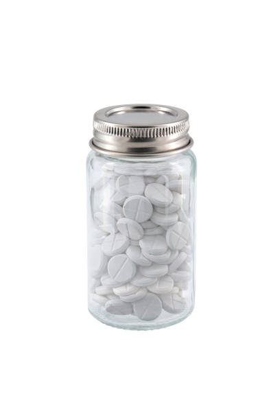 istock small medicine pills glass bottle isolated on white background 2168043985