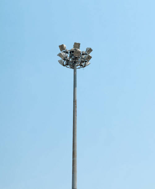 istock street lamp post isolated in blue sky background 2168045398