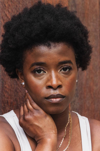 istock Sad black woman with Afro hairstyle looking at camera 2168055152