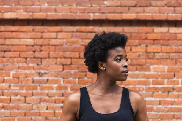istock Sad black woman with Afro hairstyle looking away 2168055375