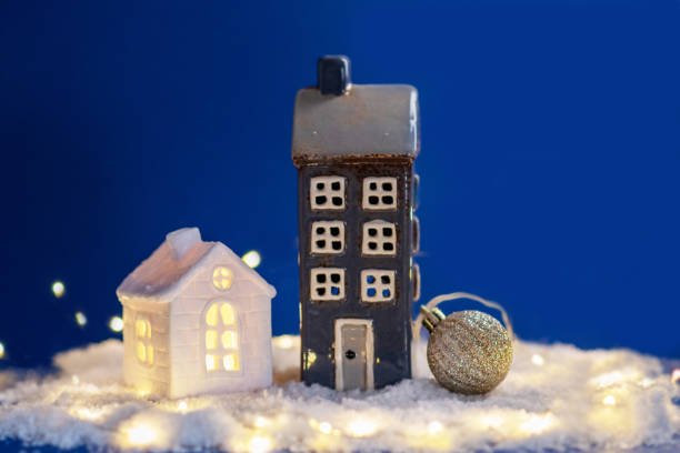 house with snow and decoration x-tree background blue