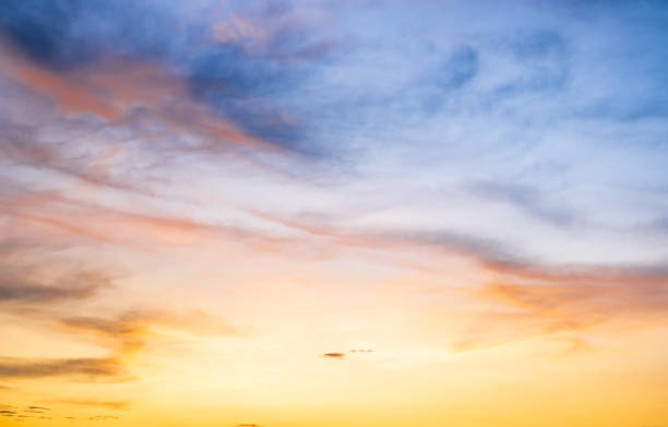 istock Beautiful , luxury soft gradient orange gold clouds and sunlight on the blue sky perfect for the background, take in everning,Twilight, Large size, high definition landscape photo 2168056286