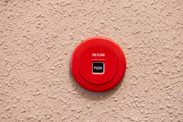 A red button with the words Fire Alarm and Push on it