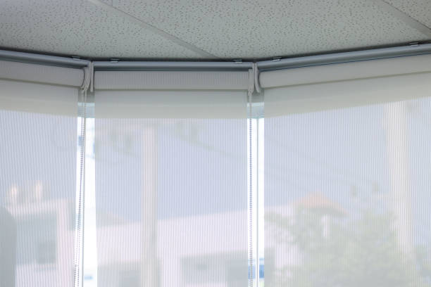 istock A white curtain with a white frame is hanging in a room 2168060146