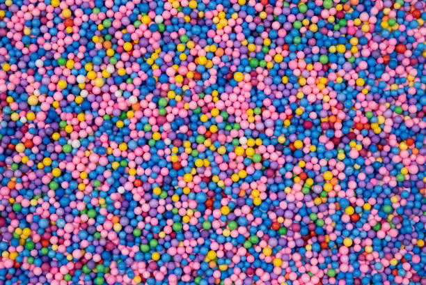 istock Vibrant and Colorful Candy Sprinkles Background Texture 2168077866