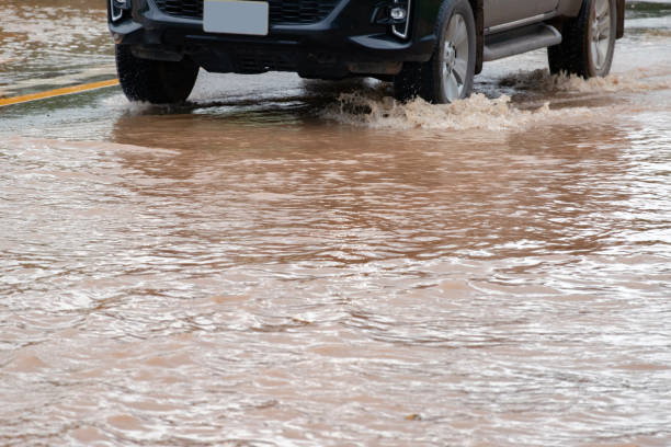 istock Flood water with car 2168086790