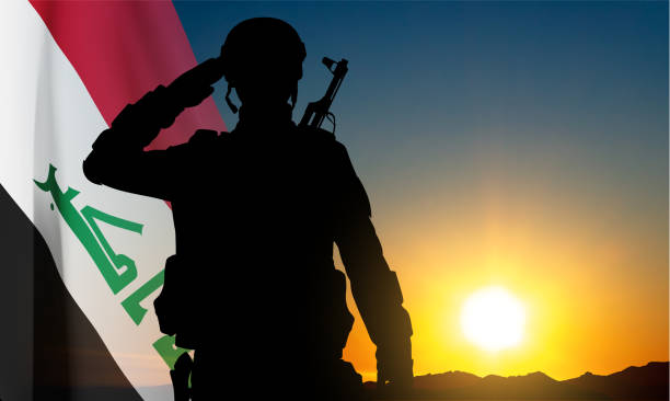 istock Silhouette of a soldier with Iraq flag 2168087914
