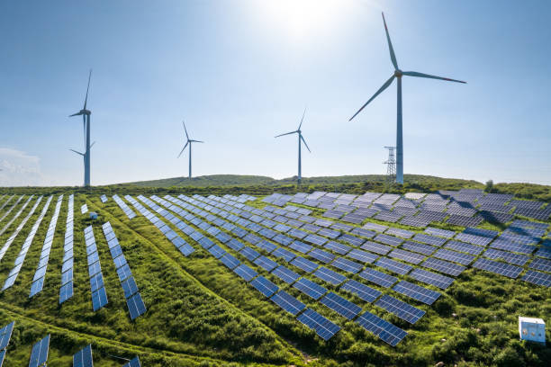 istock Wind turbines and solar panels on mountain 2168088890