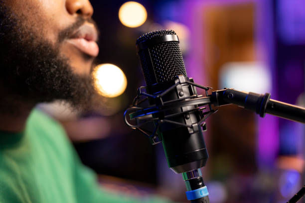 istock Musician singing his new melody creation on microphone 2168092086