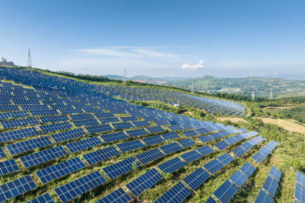 istock Wind turbines and solar panels on mountain 2168093933