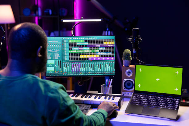 istock Music producer mixing and mastering songs on digital post production interface 2168094630