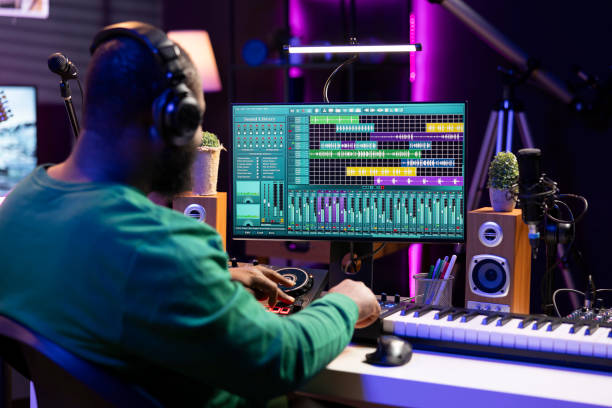 istock Tracking engineer enhancing sound quality on his audio recordings 2168097402