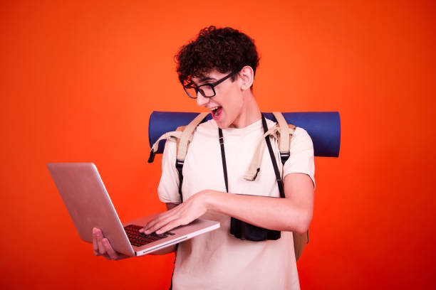 istock Vacations and holidays. Funny lost tourist with a backpack 2168098637