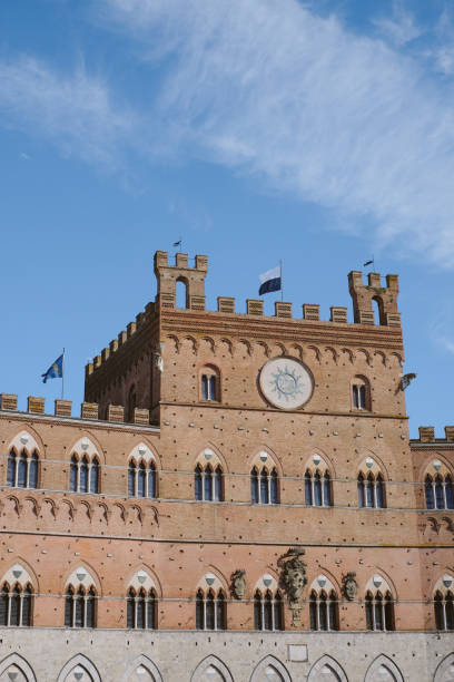 Medieval tower and buildings, Florence, Bike packing Tuscany, from the hills of Poggibonsi to the vineyards of Castellina in Chianti and Radda in Chianti