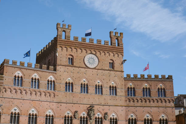 Medieval tower and buildings, Florence, Bike packing Tuscany, from the hills of Poggibonsi to the vineyards of Castellina in Chianti and Radda in Chianti