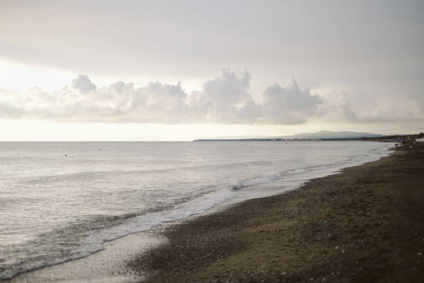 Sunset over beach and sea,  Tuscany, bike packing from Marina di Grosetto to Castiglione della Pescaia