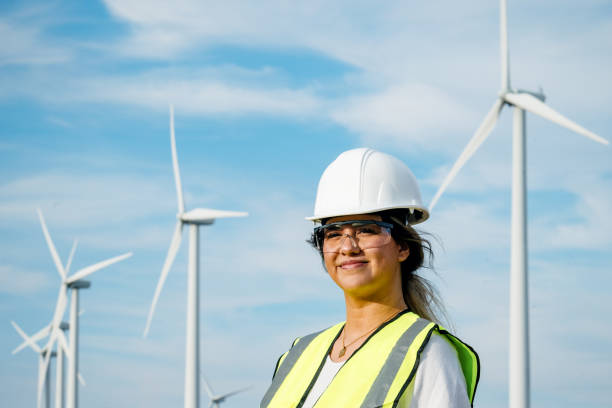 istock Woman Technician Working With Wind Turbines 2168110947