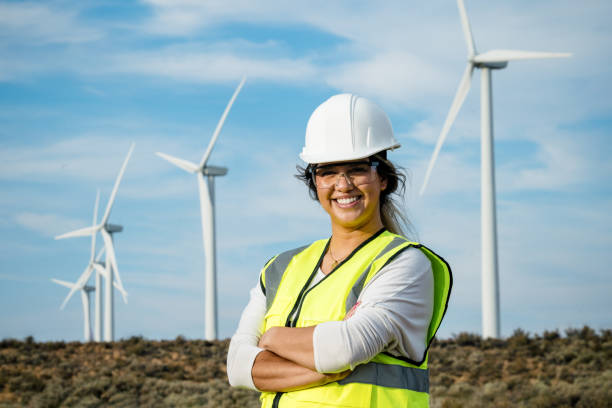 istock Woman Technician Working With Wind Turbines 2168110960