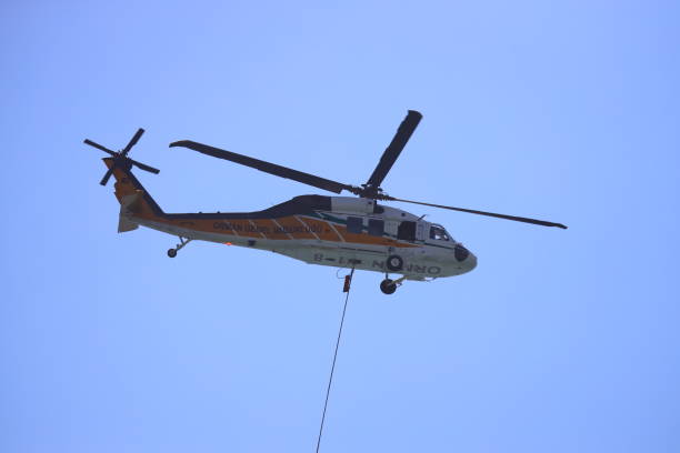 Bodrum,Turkey. 16 August 2024: Firefighting helicopter takes water from the sea.