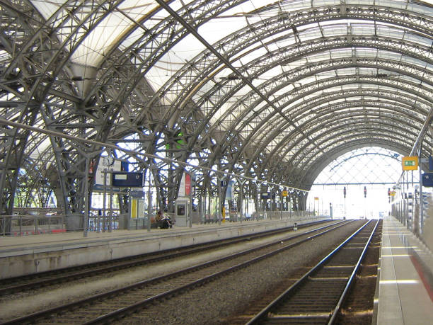 istock An empty platform covered by an iron arch at the railway station 2168115213