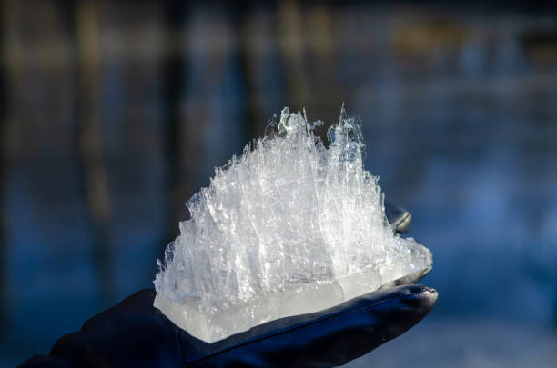 istock A close-up view of a large ice crystal held in a gloved hand 2168116741