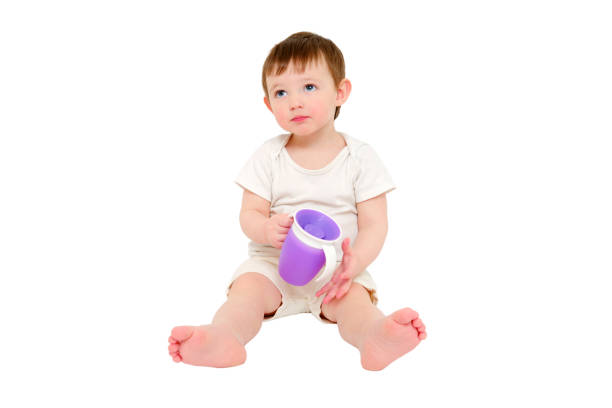 baby drinking from sippy cup