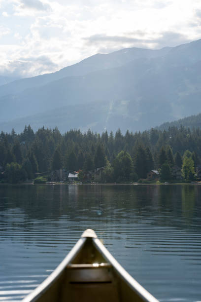 istock View past canoe bow to lake and mountains 2168121885
