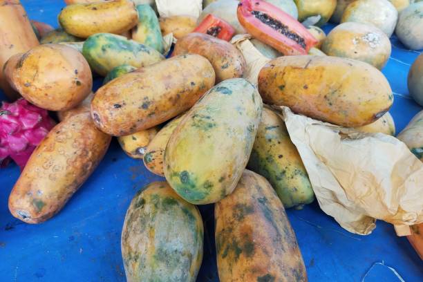 istock papaya fruit displayed in a fruit shop 2168124130