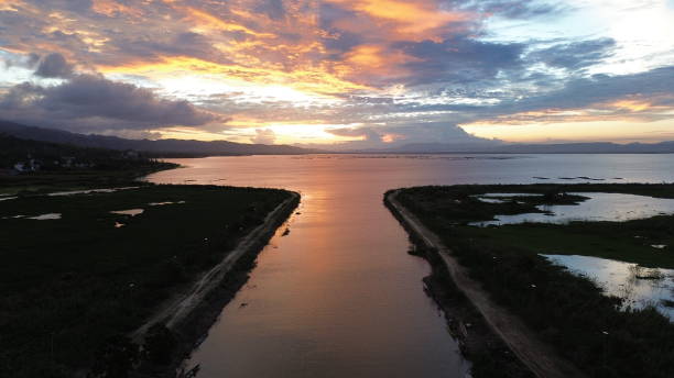 istock Aerial View of River with sunset background. Dramatic sky 2168130077