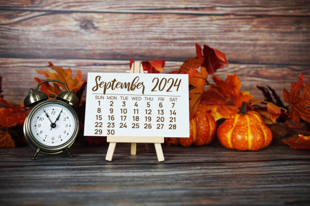 istock September 2024 monthly calendar with maple leaf on wooden background 2168145743