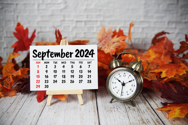 istock September 2024 monthly calendar with maple leaf on wooden background 2168146016