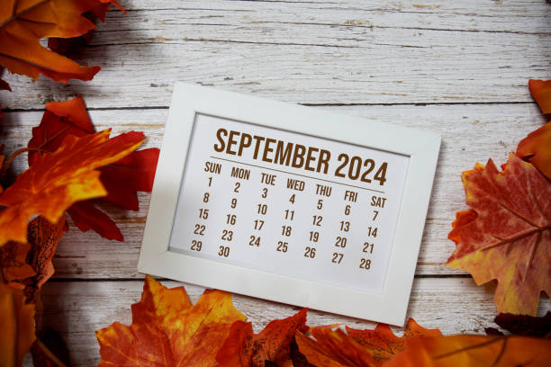istock September 2024 monthly calendar maple leaf decoration on wooden background 2168146032