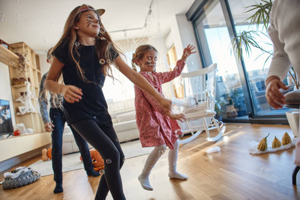 istock A group of children playing on a Halloween day 2168150419