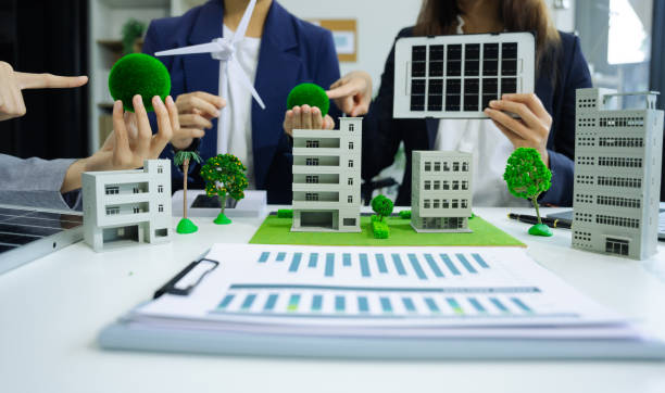 istock Engineer Teamwork Meeting, with partner on model building at company office working technology, Renewable energy-based green businesses and global warming. 2168153746