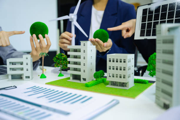 istock Engineer Teamwork Meeting, with partner on model building at company office working technology, Renewable energy-based green businesses and global warming. 2168153753