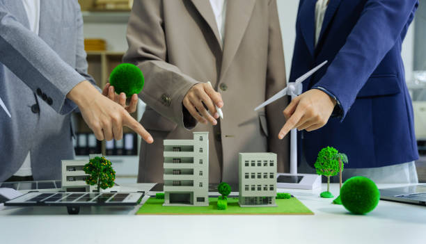 istock Engineer Teamwork Meeting, with partner on model building at company office working technology, Renewable energy-based green businesses and global warming. 2168153822