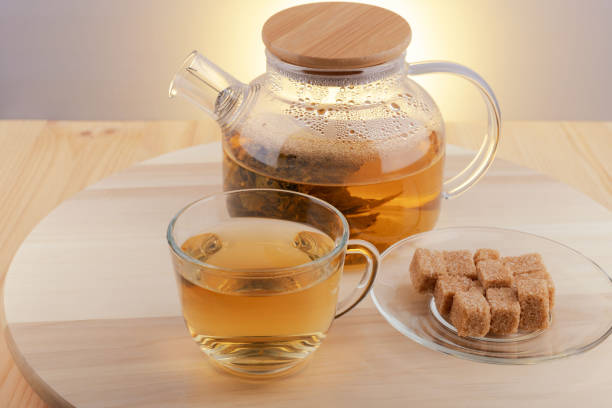 istock Tea is brewed in a glass teapot 2168158134