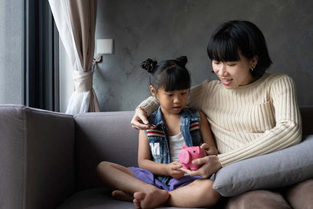 istock Mother Sharing The Idea of Money Saving 2168158307