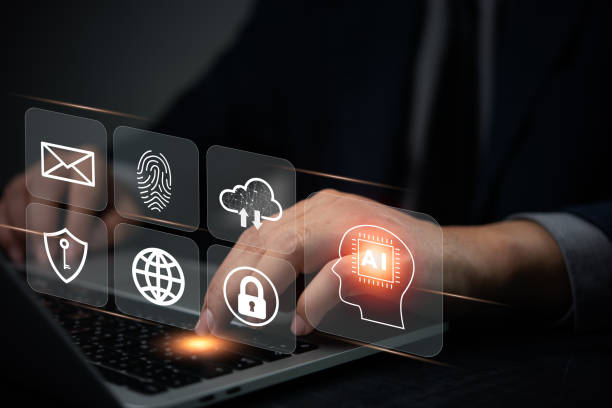 istock Hands on a laptop with digital icons of AI, cloud computing, and cybersecurity, showcasing technology integration in modern business. Suitable for tech, AI, and digital security 2168159843