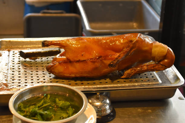 istock Peking duck roasting in a restaurant in Beijing 2168160252