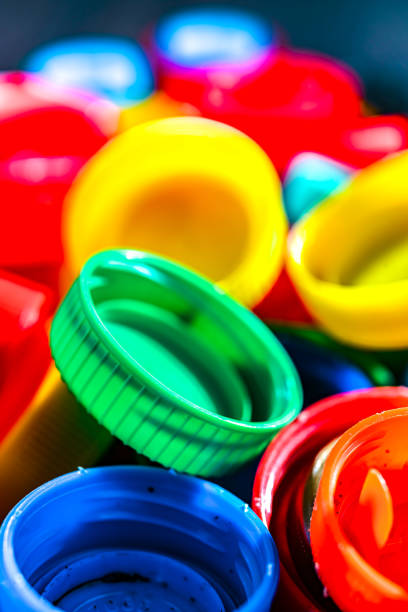 istock Different sorts of colorful plastic bottle caps. Recycling 2168163511