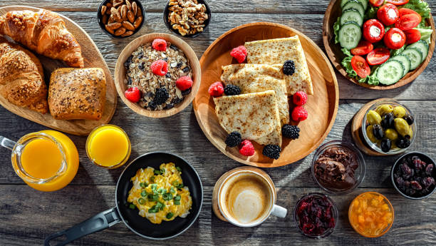 istock Breakfast served with coffee, eggs, cereals nd croissants 2168163967
