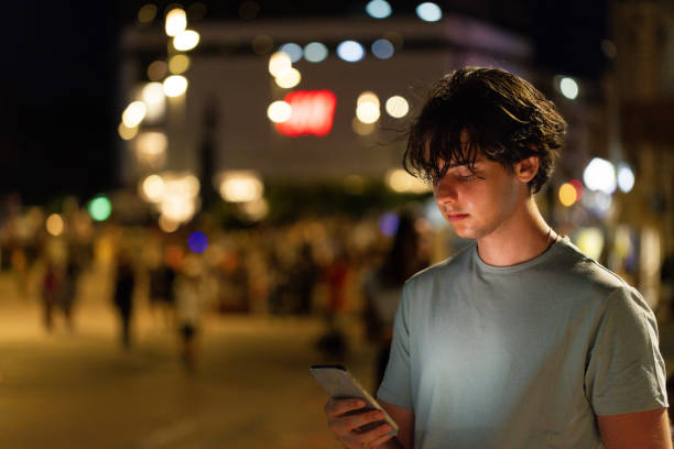istock Teenage boy in the open air with tech 2168170229