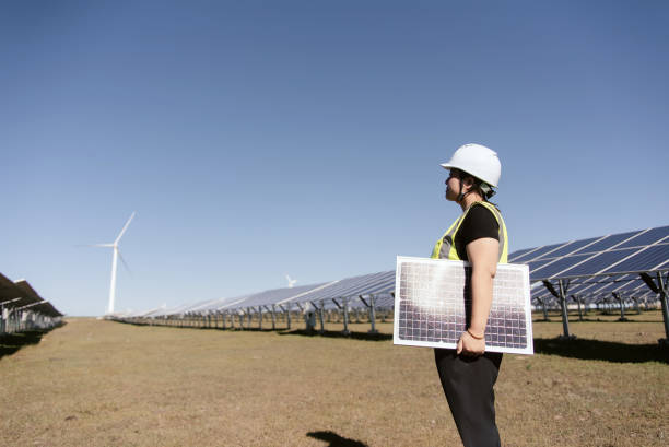 istock female technician working in solar power station 2168174734