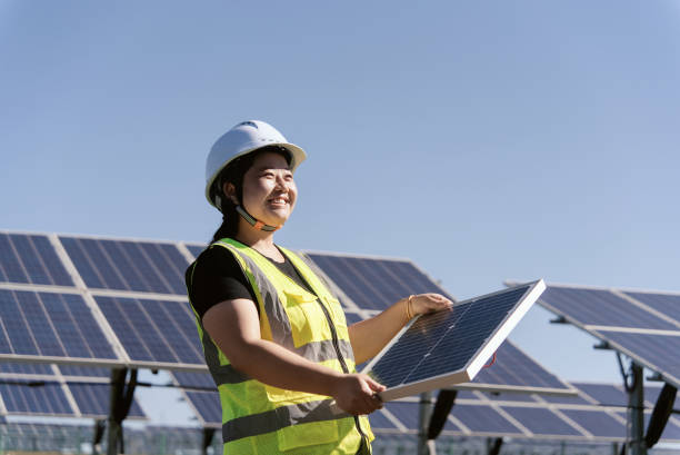 istock female technician working in solar power station 2168174888