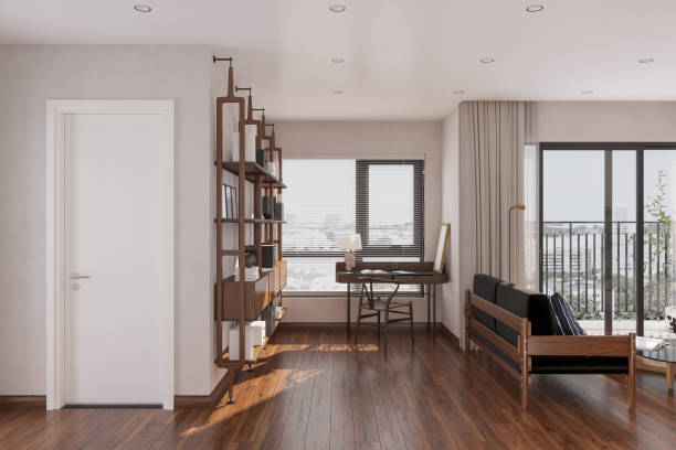 istock A modern living room with a sectional sofa and a working desk and chair, and shelves, panoramic window 2168175708