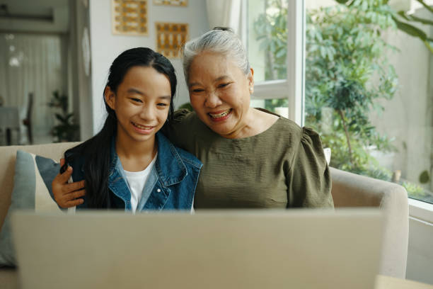 istock Family Having Online Communication On Laptop 2168180569