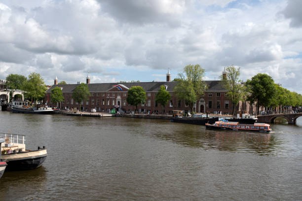 Amsterdam old town canal houses bridge boats, the Netherlands